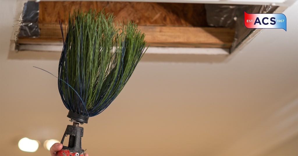 Signs Your Air Ducts Need Cleaning – Learn More cleaning vents with green duster